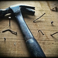 https://www.pexels.com/photo/black-claw-hammer-on-brown-wooden-plank-209235/